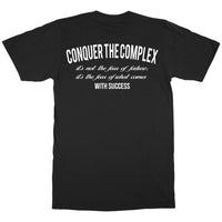 Black (back) "Conquer The Complex" text arc across top back with "it's not the fear of failure; it's the fear of what comes with success" mid back 